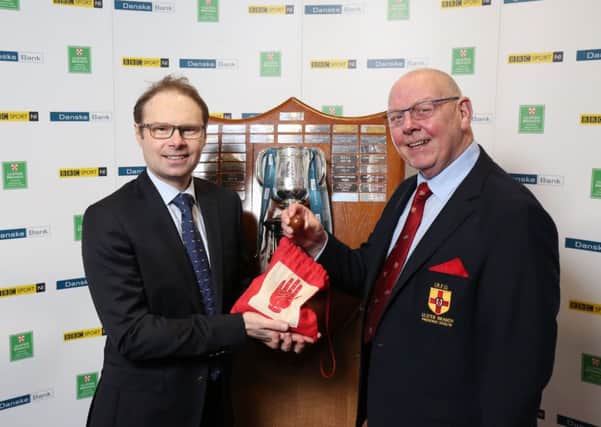 Richard Caldwell, representing Danske Bank, is pictured with Bobby Stewart, IRFU (Ulster Branch) President, as they made the Danske Bank Ulster Schools Cup round three draw at Kingspan Stadium on Saturday, during the half-time break of Ulsters 56-3 European Champions Cup win over Oyonnax.