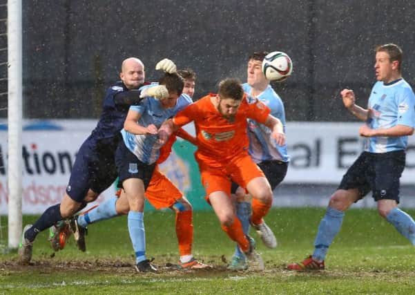 The Ballymena United defence comes under pressure during Saturday's 4-0 home defeat by Linfield. Picture: Press Eye.