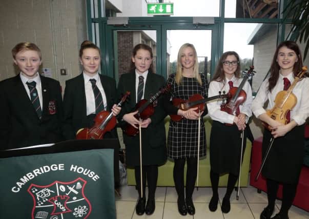 Cambridge House Grammar School musicians who entertained the visitors at the school's Open Day on Saturday. Seen here with teacher Miss Smyth are, L-R, Matthew Crawford, Naomi Houston, Sarah McIlroy, Rachael Lutton and Shania Davis. INBT 04-111JC