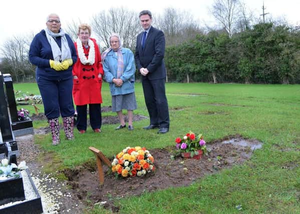Paul Frew, MLA, at Cullybackey New Cemetery last week when he met with Georgina Peacock to discuss water-logging at some of the graves. Included are Elizabeth Law and Maureen Johnston. INBT 06-811H