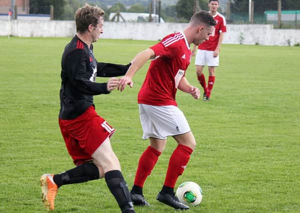 Jamie Willighan (black shirt) scored a double hat-trick for Chimney Corner in their weekend win over Sofia Farmer.