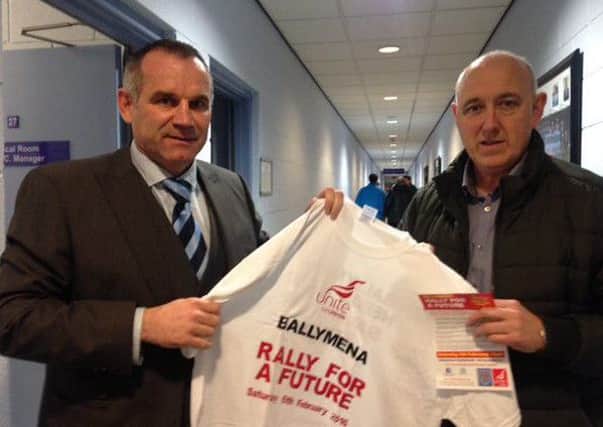 Glenn Ferguson, Ballymena United FC Manager, joins John Allen, Unite Shopsteward, Michelin in backing the Rally for a Future event to be held in the town on February 6.