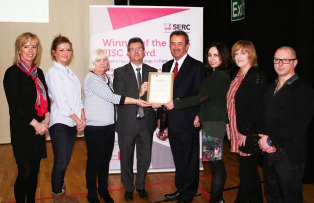 Lagan Valley MP Jeffery Donaldson this week praised SERC on winning a prestigious Beacon award for Effective Use of Technology in Further Education. Mr Donaldson is pictured with Dr Michael Malone, SERC Director of Curriculum and Information Services, Michelle Devlin Head of School of Health, Early Years and Adult Education and representatives from the Colleges Pedagogy, Essential Skills and MILT team who designed and developed the winning project.