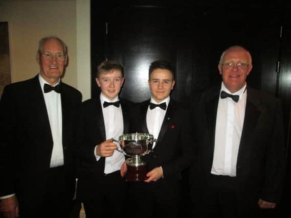 Ulster Branch Chairman Eamonn  O'Connor with Aaron Marshall,  Josh Robinson and the Lisburn Captain Ken Haslem at the Champion's Dinner in Carton House.