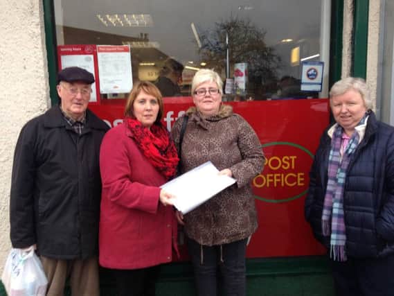 Mr Buchanan, who is a lifetime user of the Post Office and one of the signatories of the petition, Councillor Jenny Palmer, Trish McCormick Chair of Hilden Community Assocication, and Mrs Shirley Carringto, who is  involved with Seymour Street Methodist Church outreach.