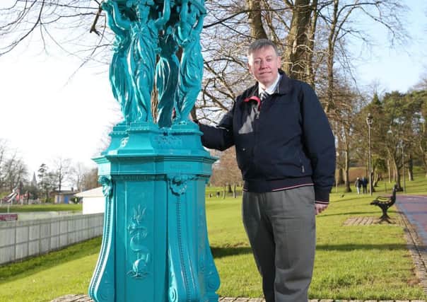 Alderman Paul Porter, Chairman of the Leisure and Community Development Committee with the new water fountain in Wallace Park.