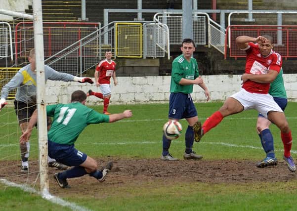 Guillaume Keke on the attack for Larne FC in their Intermediate Cup game with Downpatrick at Inver Park. INLT 04-002-PSB