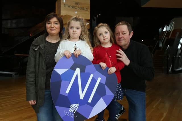 Pauline, Billy, Emily and Lily McDonald from Carrickfergus, who were winners of 'golden tickets' to visit Titanic Belfast during NI Citizens Day. Picture by Darren Kidd / Press Eye.  INCT 05-720-CON