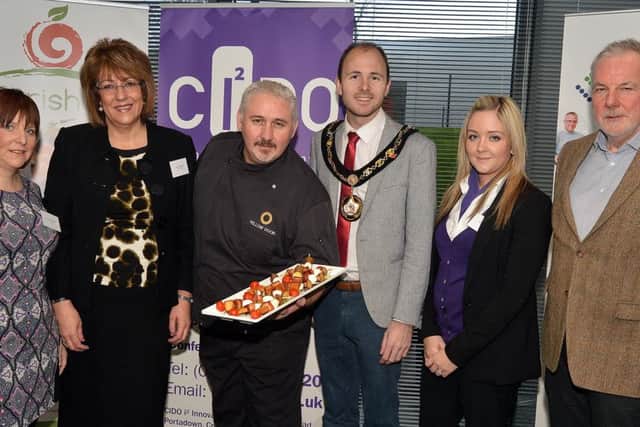 The Mayor, Councillor Darryn Causby joined guest speakers and representatives from Cido at the launch of Nourish EU NI/UK Healthy Food Partnership Toolkit. This event provided an opportunity for food SMEs from the North and the South of Ireland to network with suppliers and distributors.  In keeping with the theme of 2016 Year of Food, the Yellow Door provided a healthy breakfast for all those who attended. Pictured from left to right are as follows Dawn McCloughlin, ALS Global, Arlene Mawhinney, CIDO, Simon Dougan, Yellow Door, The Mayor, Councillor Darryn Causby, Kirsty Watson, CIDO and Clifford Webb, La Rousse Foods. INPT05-200.