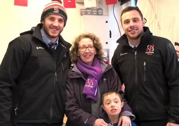 David Steele with mum Lyn and Ulster rugby stars Stuart McCloskey and Tommy Bowe before a recent match at Kingspan. INPT05-036