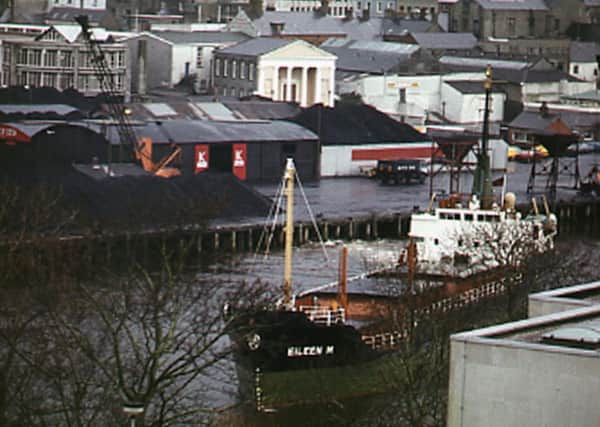 The Eileen M with, in the background, Kelly's coalyard at Coleraine Harbour.