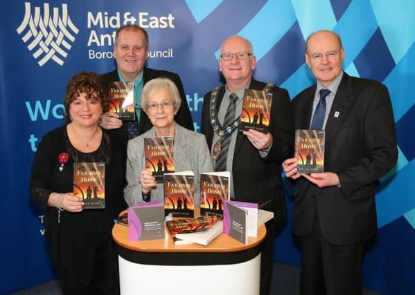 Mid and East Antrim Mayor, Councillor Billy Ashe, pictured at the Holocaust Memorial Day event in Larne Town Hall, with author Marilyn Taylor and Cllr Gerardine Mulvenna, Cllr Paul Reid and Cllr Declan OLoan.  INLT 05-650-CON