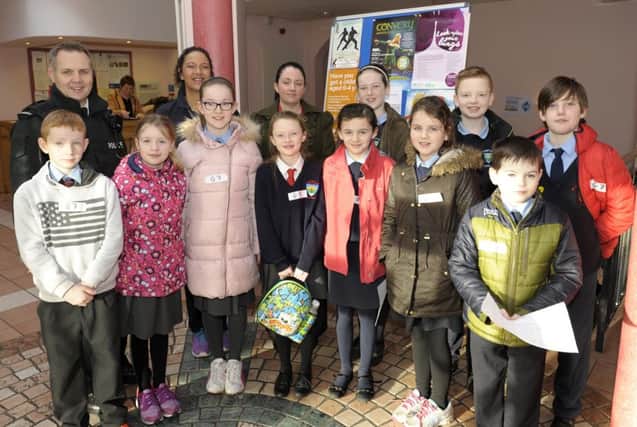 Local Primary School Pupils who took part in Be Safe 2016 are pictured with PSNI Con Colin Madine and Community Safety Warden Helen Coop Â©Edward Byrne Photography INBL1605-221EB