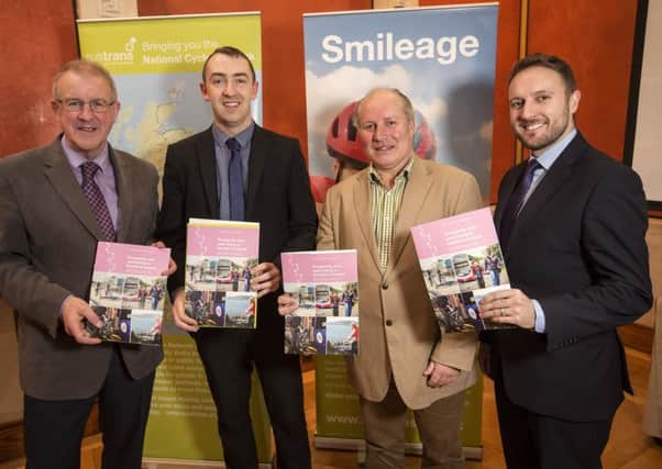 SF MLA DaithÃ­ McKay with Sustrans representatives and Chris Little MLA at the launch of the Sustrans manifesto.