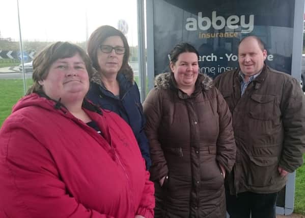 Pictured at Millbrook bus stop are Angela Houston, Shirley McCalmont, Amanda Price and Alderman Gregg McKeen.  INLT 05-654-CON