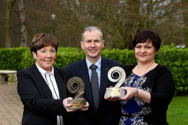 Joanne Liddle (right),  of IPC Mouldings, Carrickfergus and Patricia Clements,  managing director of Balfor, with George Wilson of the Centre for Competitiveness, which organises the EFQM Ireland Excellence Awards. INCT 05-701-CON