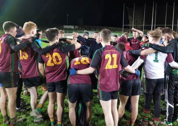 A victory huddle by the St Ronan's team.