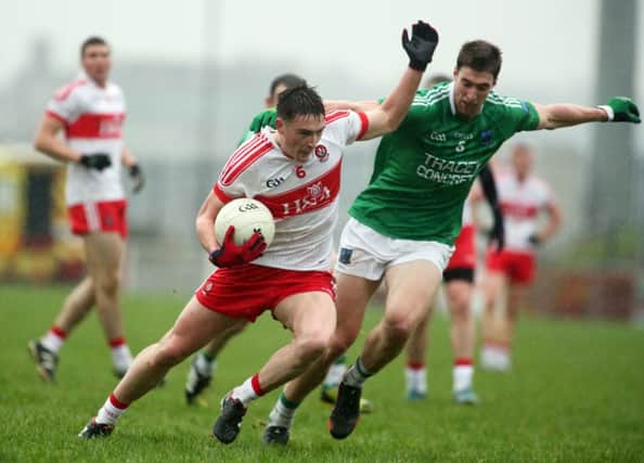 Derry's Gareth McKinless takes on Fermanagh's Conall Jones in Celtic Park on Sunday.


 (Photo Lorcan Doherty / Presseye.com)