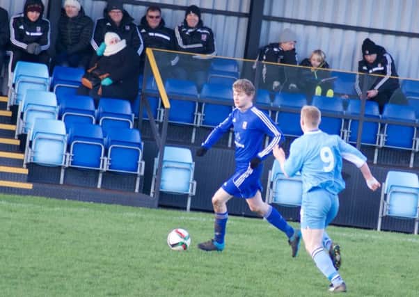 Full-back Conor Ross surges forward during Wakehurst's weekend defeat at Portstewart.