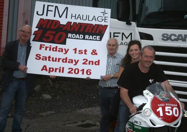 Jack Agnew, from the Mid Antrim club, with Sean Crawford and Benita McShane of JFM Haulage. On the bike is Davy McCartney, Clerk of the Course of the meeting. Picture: Roy Adams.
