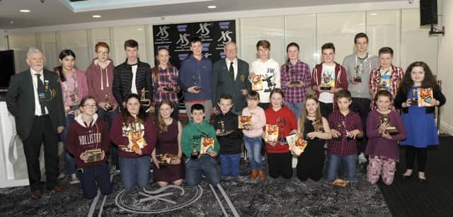 Ballyvally Archery Club President Frank Mulligan and Special Guest Andy Haggan pictured at the Annual Prize Night with the Junior Trophy winners Â©Edward Byrne Photography INBL1605-227EB
