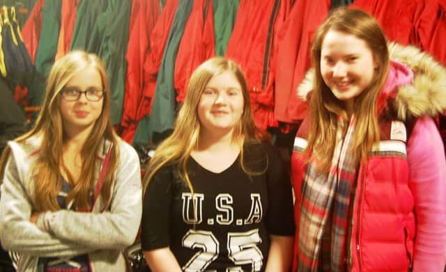 Maeve, Megan and Lauren at a recent cross community weekend in Bushmills. SUPPLIED