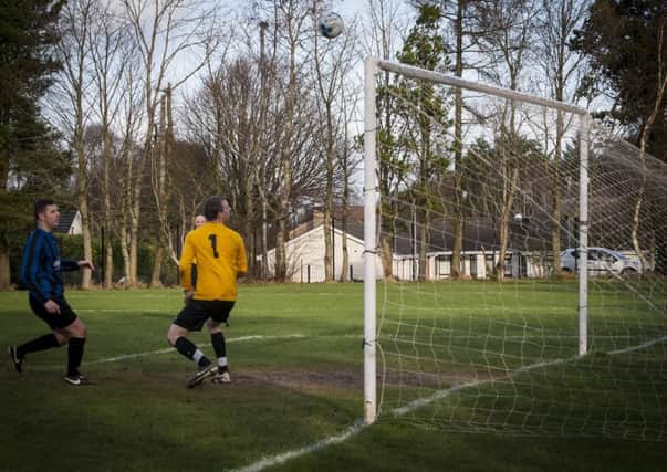 Ardmore goalkeeper John Joe McGilloway watches anxiously as this lob sails over the crossbar, during Saturday's win over BBOB at Lisnagelvin. INLS0416MC023