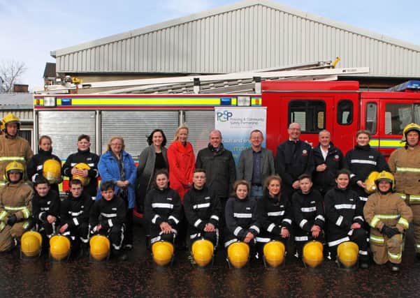 Pictured with the young participants on the NIFRS LIFE Scheme who graduated on Friday are, back row, from left:  Linda Watson, Independent PCSP member; Linda McDaid, Youth Diversion Officer; Vanessa Russell, Derry and Strabane PCSP Manager; Dermot Harrigan, Derry & Strabane PCSP manager; Councillor Eric McGinley, Derry & Strabane PCSP Chairman; Station Commander Kieran Doherty, Community Safety; Group Commander Eamon Gallagher -Community Safety .