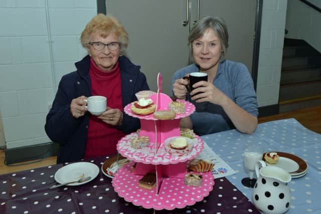 Helen Grier and Linda Hutchinson enjoying a cuppa in Whitehead Community Centre. INCT 05-022-PSB