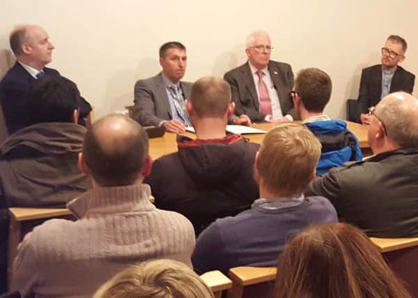 Cllr Tom Campbell, Supt. Muir Clark and Stewart Dickson MLA meeting with local residents to discuss the recent spate of car crimes in the Jordanstown area. INNT 05-534CON