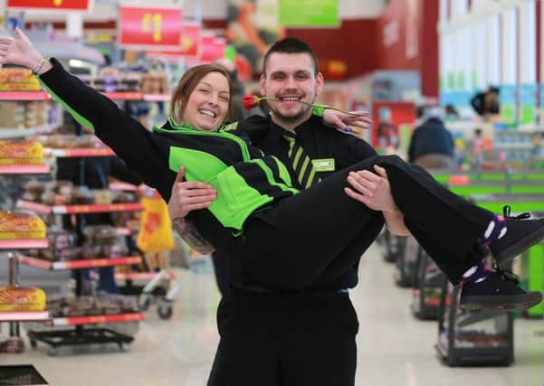 Asda Larne colleagues Kirsty Reid and Carl Heggarty.  INLT 05-660-CON