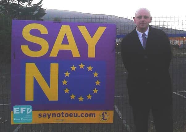 North Belfast UKIP representative Ken Boyle with one of the party's 'Say No' posters. INNT 05-540CON