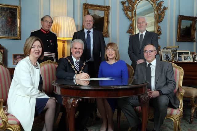 In Hillsborough Castle, where British Citizenship Ceremonies will take place and administered by Lisburn & Castlereagh City Council are (l-r) Dr. Theresa Donaldson, Chief Executive; Mayor, Councillor Thomas Beckett; Mrs Patricia Corbett, Head of Hillsborough Castle; Mr Nigel Hills, UK Visas and Immigration, Home Office and (back) Lord Lieutenant of County Down, Mr David Lyndsay; Alderman James Tinsley, Chairman of the Council's Corporate Services Committee and Mr Adrian Donaldson, Director Corporate Services, Lisburn & Castlereagh City Council.