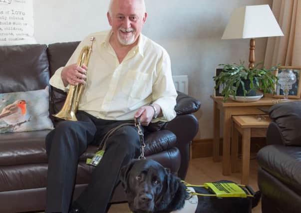 Trevor Gibb and guide dog Oscar. INPT0616-427