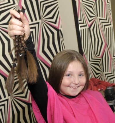 All done, Chelsy with her locks for the Princess Trust Â©Edward Byrne Photography INBL1606-216EB
