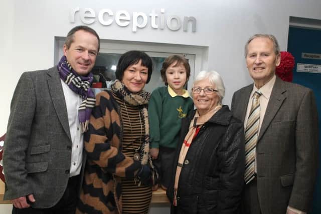 JUST GRAND. Pupil Alfie Dunlop, pictured with his parents, Wallace and Mary and Grandparents Johnny and Kay Dunlop at St Brigid's PS on Monday.INBM6-16 001SC.
