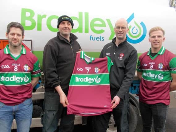 Joe Bradley of Bradley Fuels presented Eoghan Rua with a new set of jerseys ahead of their All-Ireland Junnior Hurling championship final in Croke Park on Sunday 7th February. Pictured from left to right -  Anton Rafferty (captain), Joe Bradley, Padraig " MianÃ¡in (manager) and Ciaran Gaile.
