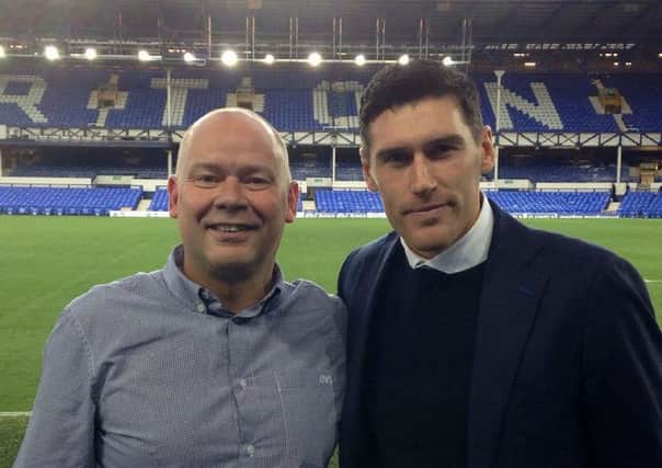 Carniny Amateur and Youth FC Chairman Lee Barry pictured withhis cousin Premiership star Gareth Barry on a recent trip to Goodison. Gareth has pledged to visit Carniny as a guest of honour later in the year
