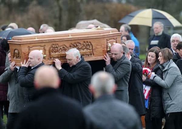 Press Eye - Belfast - Northern Ireland - 5th February  2016

Funeral of former Derry City FC striker, Mark Farren, has takes place in County Donegal.  Mr Farren had been receiving treatment for an aggressive brain tumour. Hundreds of mourners gathered for the service in Ballybrack near Moville.  His coffin is taken from St Mary's Church to be buried in the adjourning graveyard followed by his wife Terri.

Picture by Jonathan Porter/PressEye