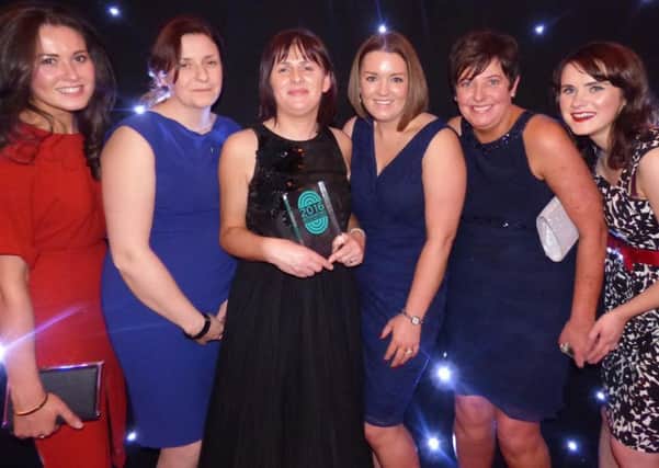 Karen Walls, centre, with some of the Occupational Therapists that won an award for their GPS dementia program