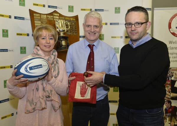 Ballymena Academy principal and Ulster Schools' Rugby representative Stephen Black (centre) makes the draw for the quarter-final of the Danske  Bank Schools' Cup, with Mary Phillips, Ballyclare Branch Manager and Chris Webster Ulster Rugbys Domestic Rugby Manager. Picture: Press Eye.