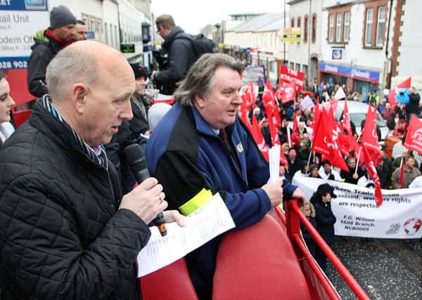 Ballymena factory worker John Allen addresses the audience on Wellington Street for the jobs rally. INBT 07-821H