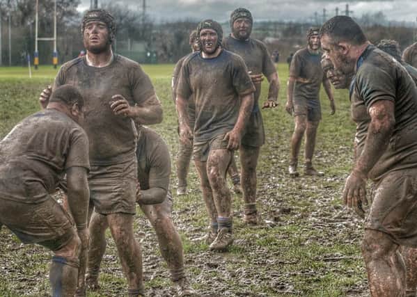 Mud bath...Lisburn 2nd XV and Rainey 3rd XV played in difficult conditions at the weekend. Lisburn won 15-7. Pic by Gary Barlow