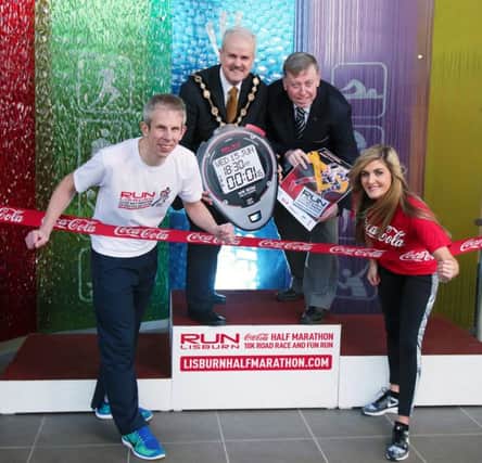 At the launch of the 2016 Coca-Cola Lisburn Half Marathon, 10K Road Race and Fun Run is; l-r John Devlin, Marathon Runner and Active Communities Athletics Coach, Mayor of Lisburn & Castlereagh City Council, Councillor Thomas Beckett, Chairman of the Leisure & Community Development Committee, Alderman Paul Porter, and Sarah Smith, PR Coordinator at Coca-Cola HBC Northern Ireland.