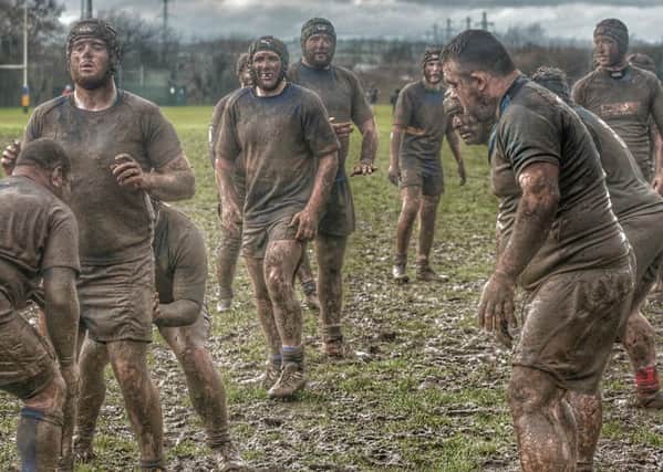 Mud bath...Lisburn 2nd XV and Rainey 3rd XV played in difficult conditions last weekend. Lisburn won 15-7. Pic by Gary Barlow
