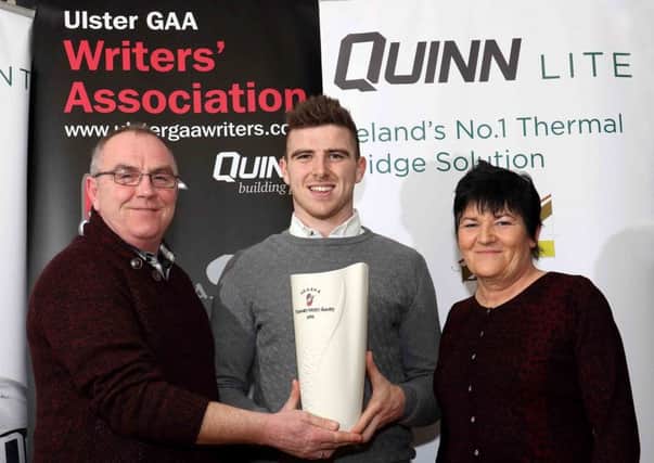 Connor McAliskey, Tyrone, winner of the Quinn Products Ulster GAA Writers January Monthly Award, pictured with his parents Sean and Bertilla McAliskey.
Pic: Peadar McMahon