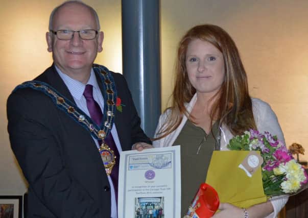 Mayor Cllr Billy Ashe with Carrickfergus Test Town winner Lisa Davis.  INCT 07-720-CON
