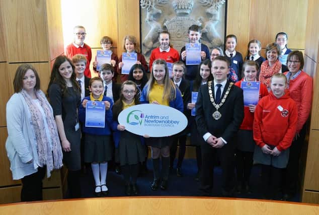 Newtownabbey and Antrim Mayor Thomas Hogg joins the Primary School children from St Josephs, Fairwiew, Templepatrick, Ballycraigy, Straid, Greystone, Parkhall Integrated Collegeand Belfast High School who took part in the Environmental Youth Speak heat held last week in Antrim Civic Centre. INBT 08-811H