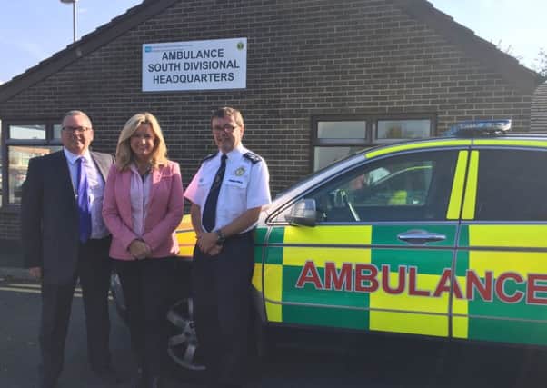 Jo-Anne Dobson MLA with Northern Ireland Ambulance Service Chief Executive Liam McIvor and Assistant Director of Operations, John Wright.