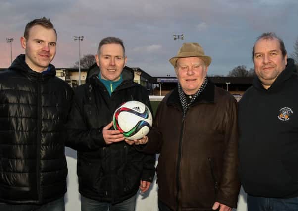 Lisburn Distillery ball sponsors - Ivan White (centre right) was the match ball sponsor against Loughall, whilst the New City Whites Supporters Club sponsored the ball in the game against Queen's University. (L-rR) Club members Daryl Connery, Paul Connery and Les Clarke are pictured. Picture - David Hunter.